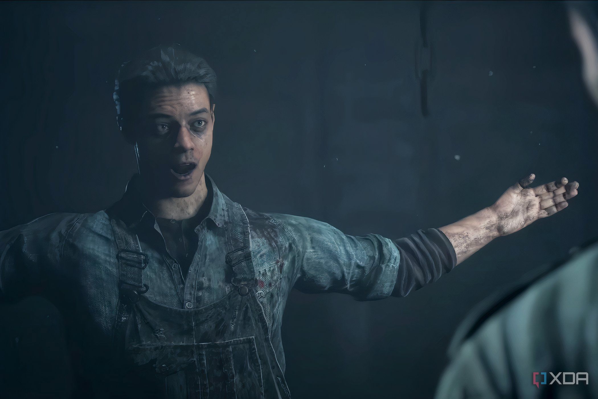 A screenshot from the game "Until Dawn", showing a man in overalls with blood and dirt on him.