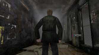An in-game screenshot from the game Silent Hill 2, showing a man standing in the middle of a dingy alley.