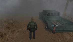 An in-game screenshot from the game Silent Hill 2, showing a man standing next to a green pickup truck while standing on a dirt road.
