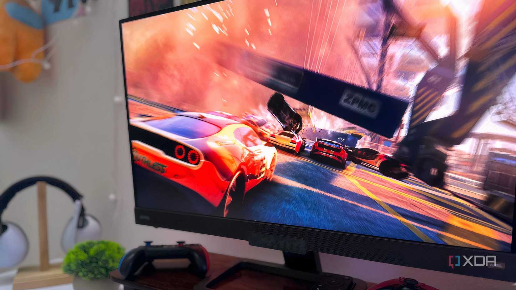 An image of a car-racing video game on a monitor.