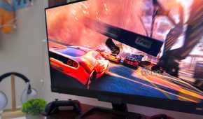 An image of a car-racing video game on a monitor.