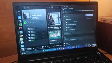 Laptop screen showing Spotify and Windows Focus side by side