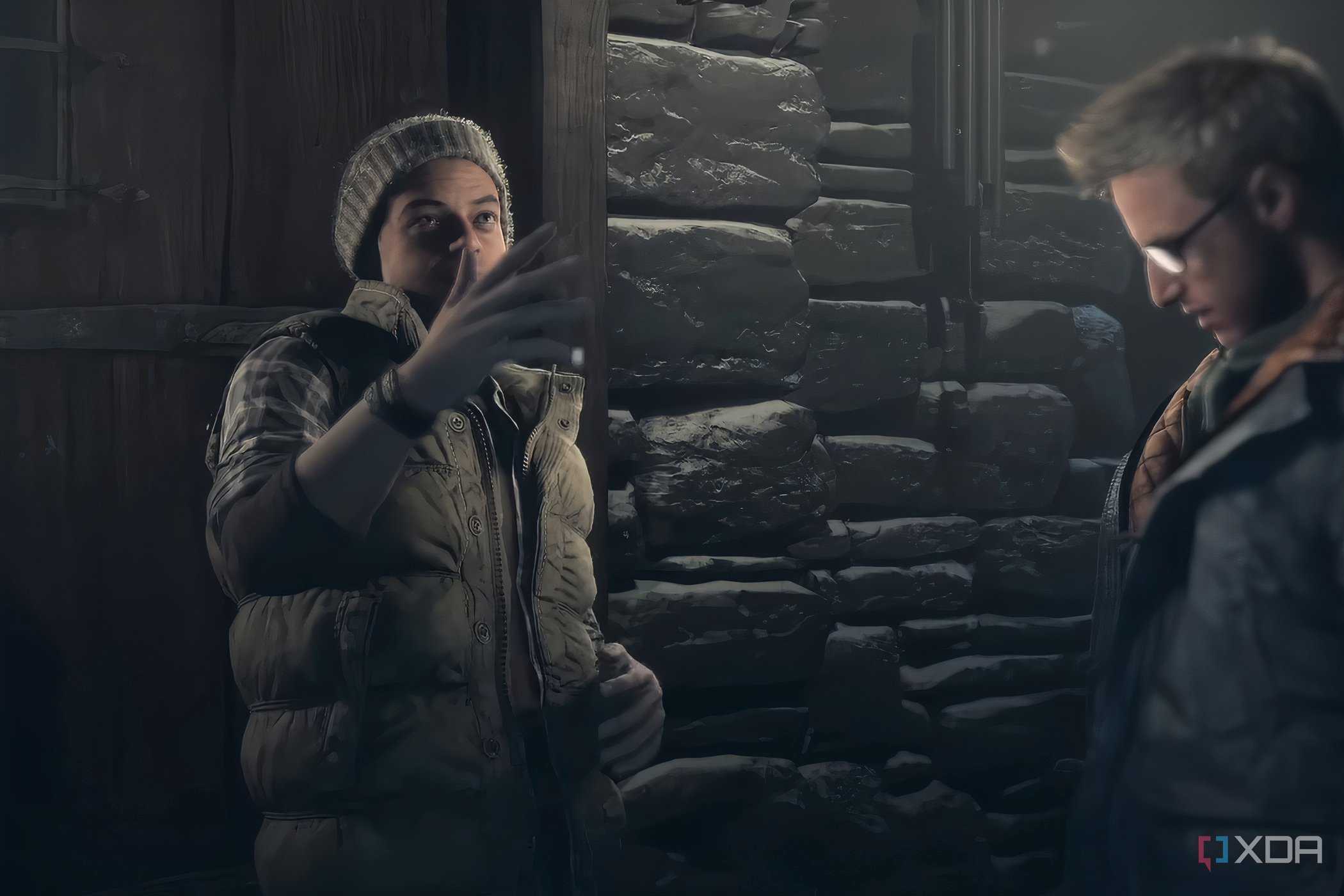 A screenshot from the game "Until Dawn", showing two characters in heavy woollen clothing.