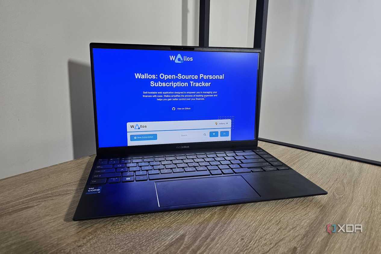 the wallos website displayed on a laptop