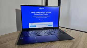 the wallos website displayed on a laptop