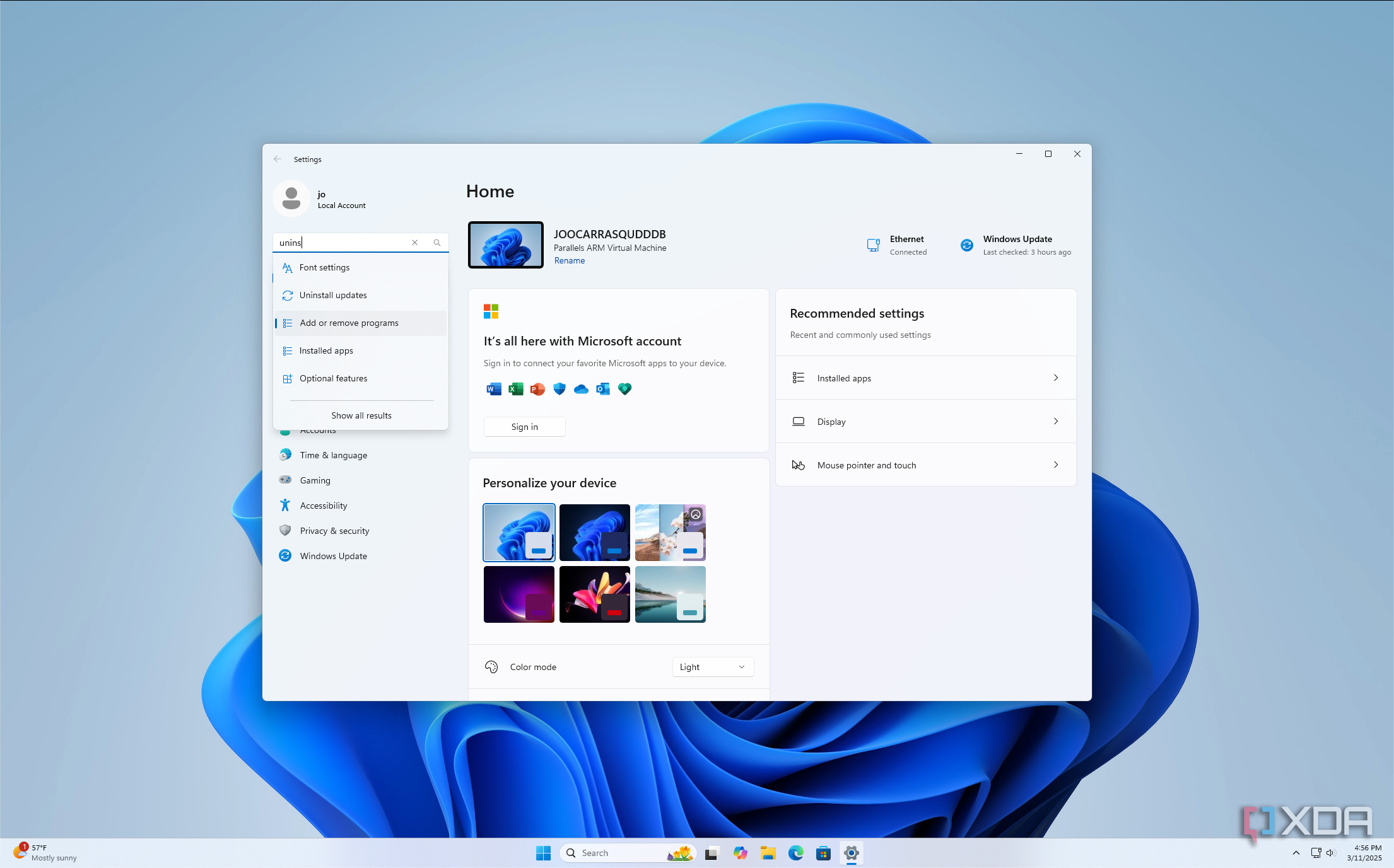 Screenshot of the Windows 11 Settings home page with search results shown for uninstall