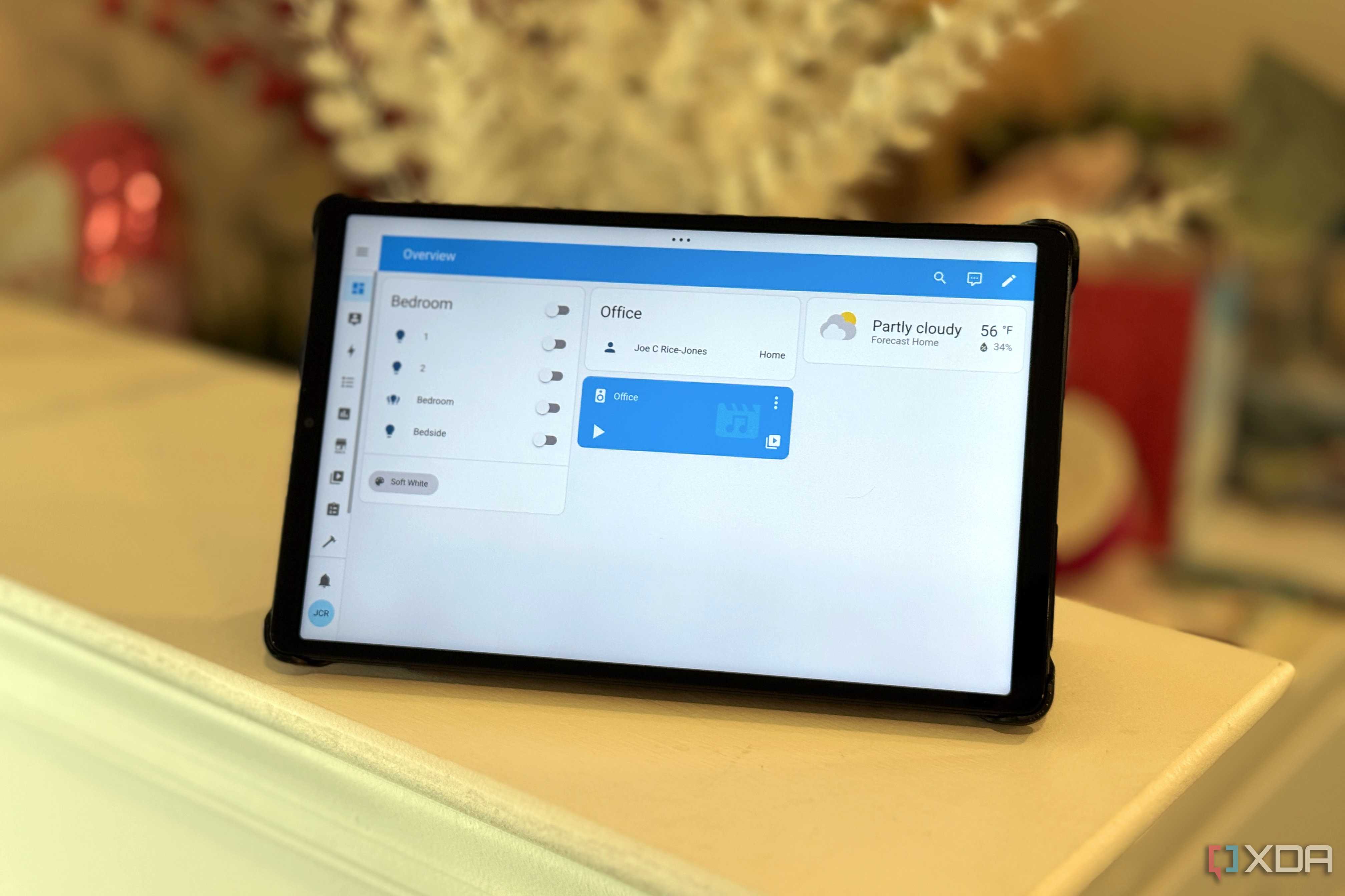 A photo of a Home Assistant software dashboard on an Android tablet