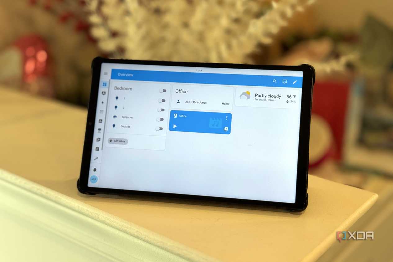 A photo of a Home Assistant software dashboard on an Android tablet