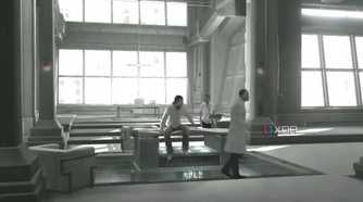 An image from the game Assassins' Creed 1, showing Desmond Miles captive at Abstergo Industries with Warren Vidic.