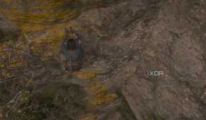 A screenshot from Assassin's Creed Shadows, showing Naoe climbing across yellow-painted handholds on a mountain face.