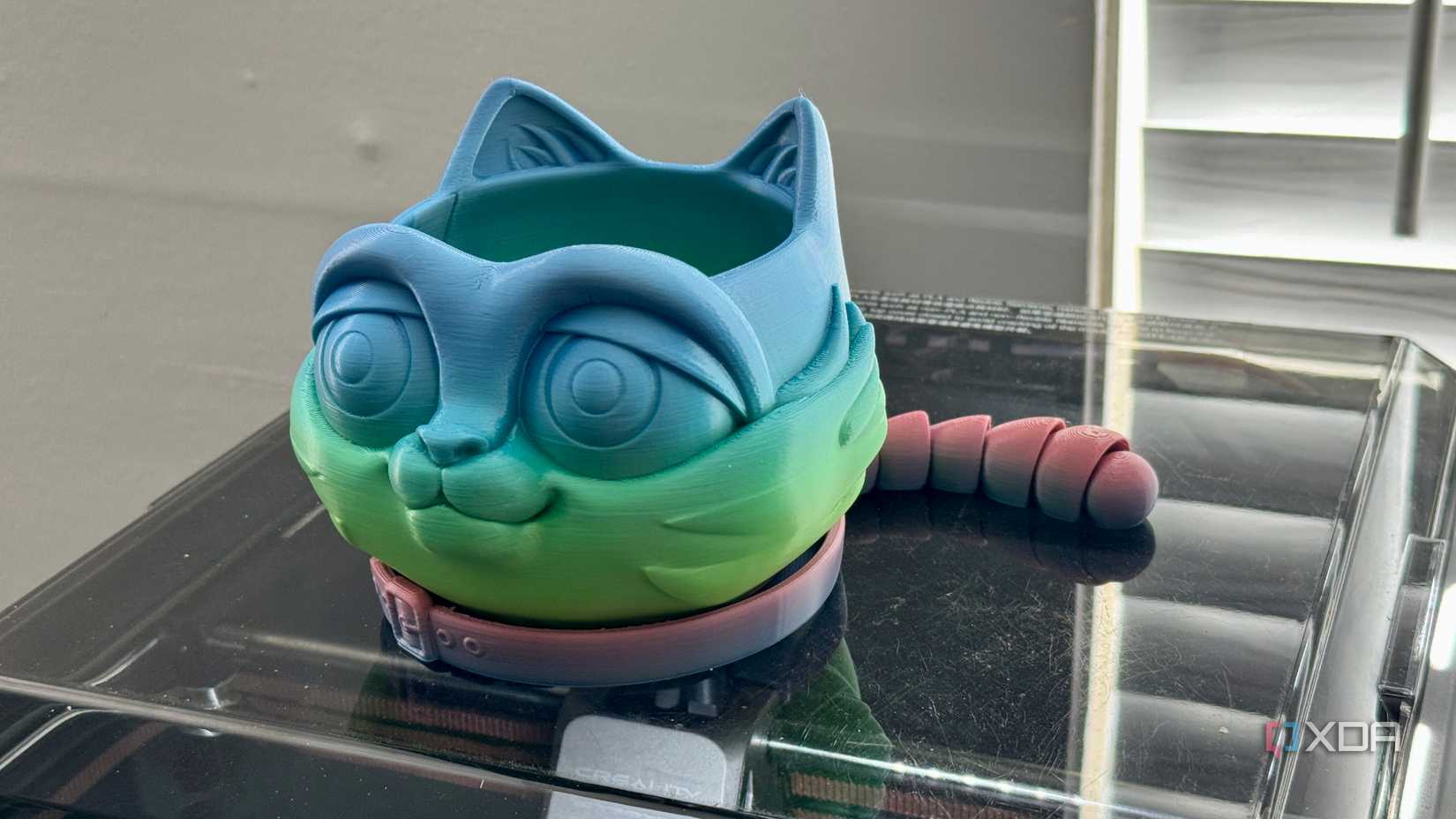 Cat planter on top of 3D printer
