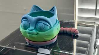 Cat planter on top of 3D printer