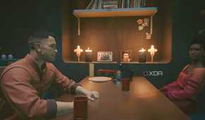 A screenshot from Cyberpunk 2077, showing two people sitting across from each other at a table.