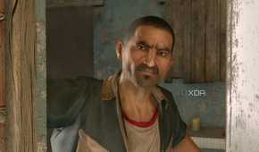 A screenshot from Dying Light, showing a man looking through a door and frowning.