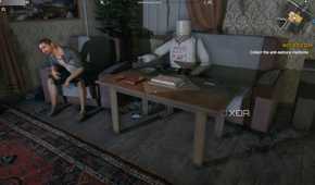A screenshot from Dying Light, showing a man sitting on a chair next to a life-sized puppet.