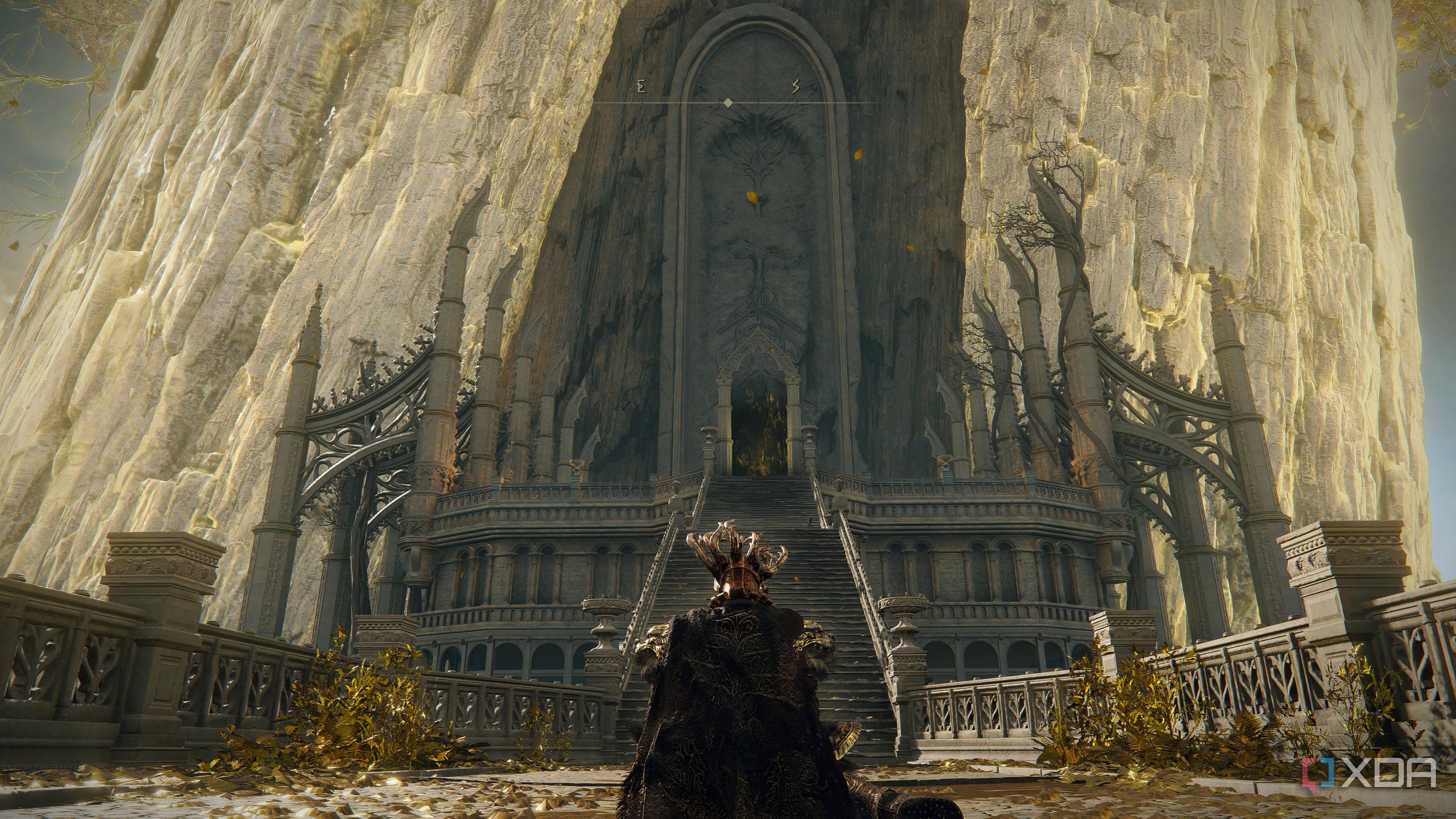 An image from the game Elden Ring, showing a gigantic, glowing tree.