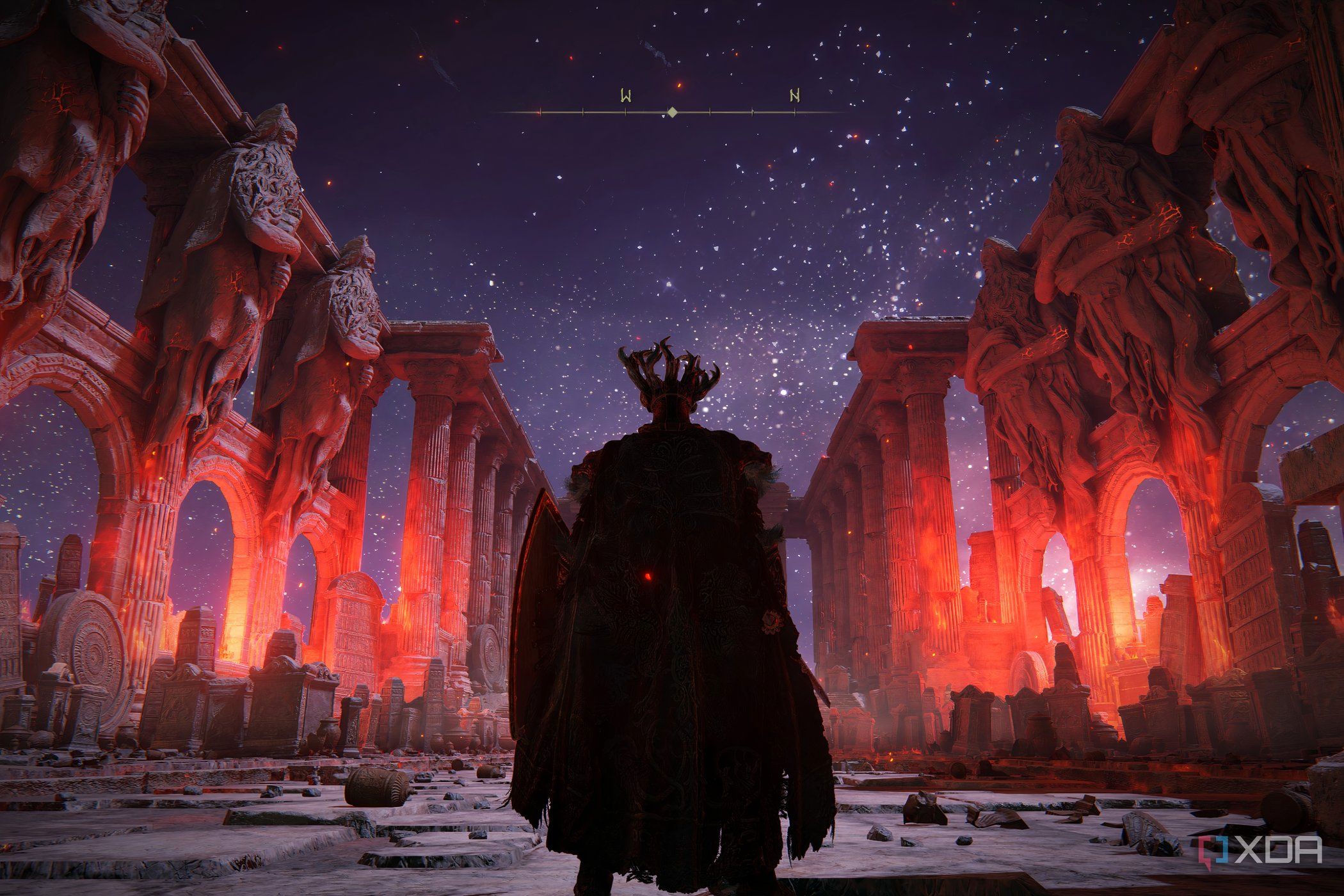 An image from Elden Ring, showing the player character standing in a blood-red, ruined hall.