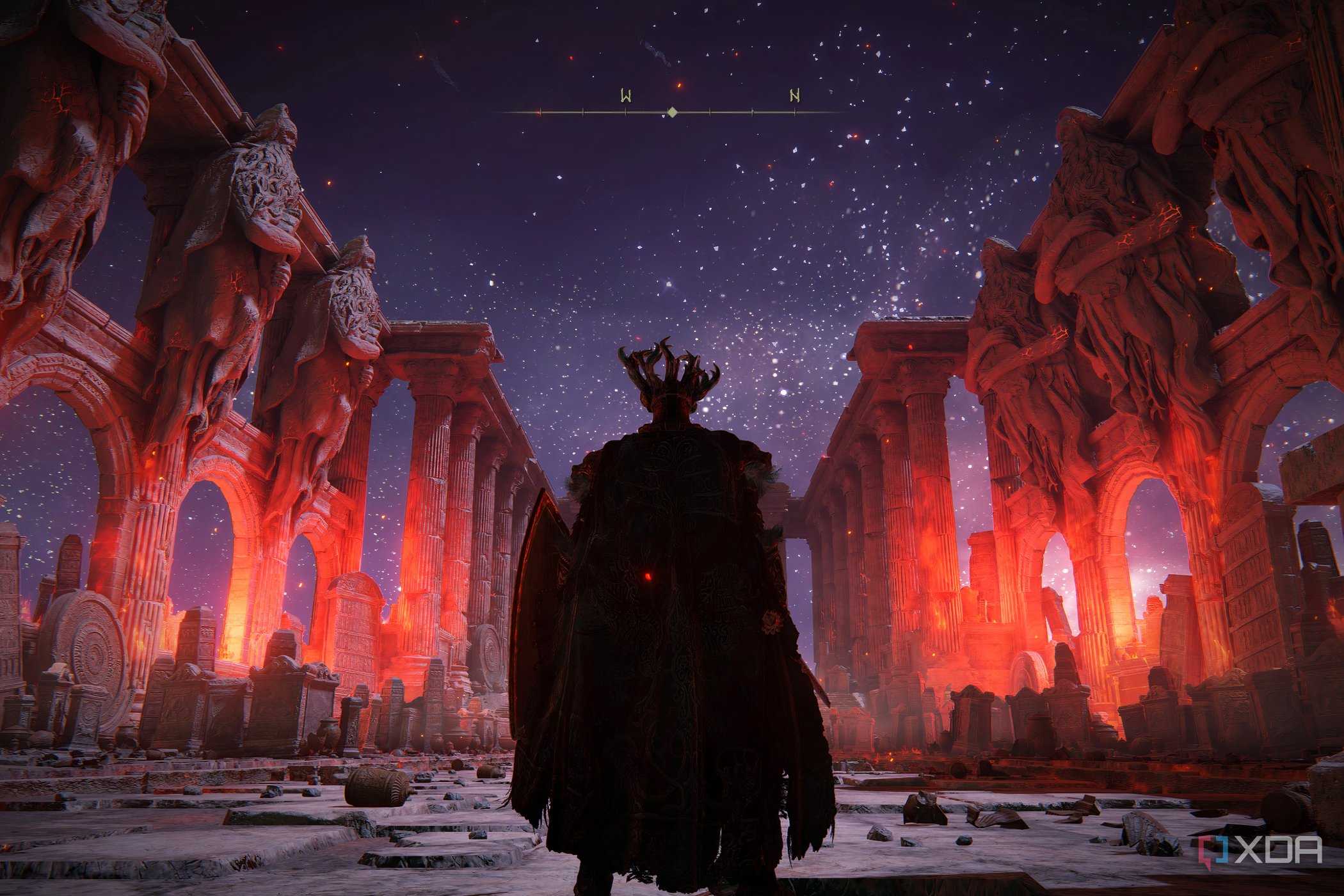 An image from Elden Ring, showing the player character standing in a blood-red, ruined hall.