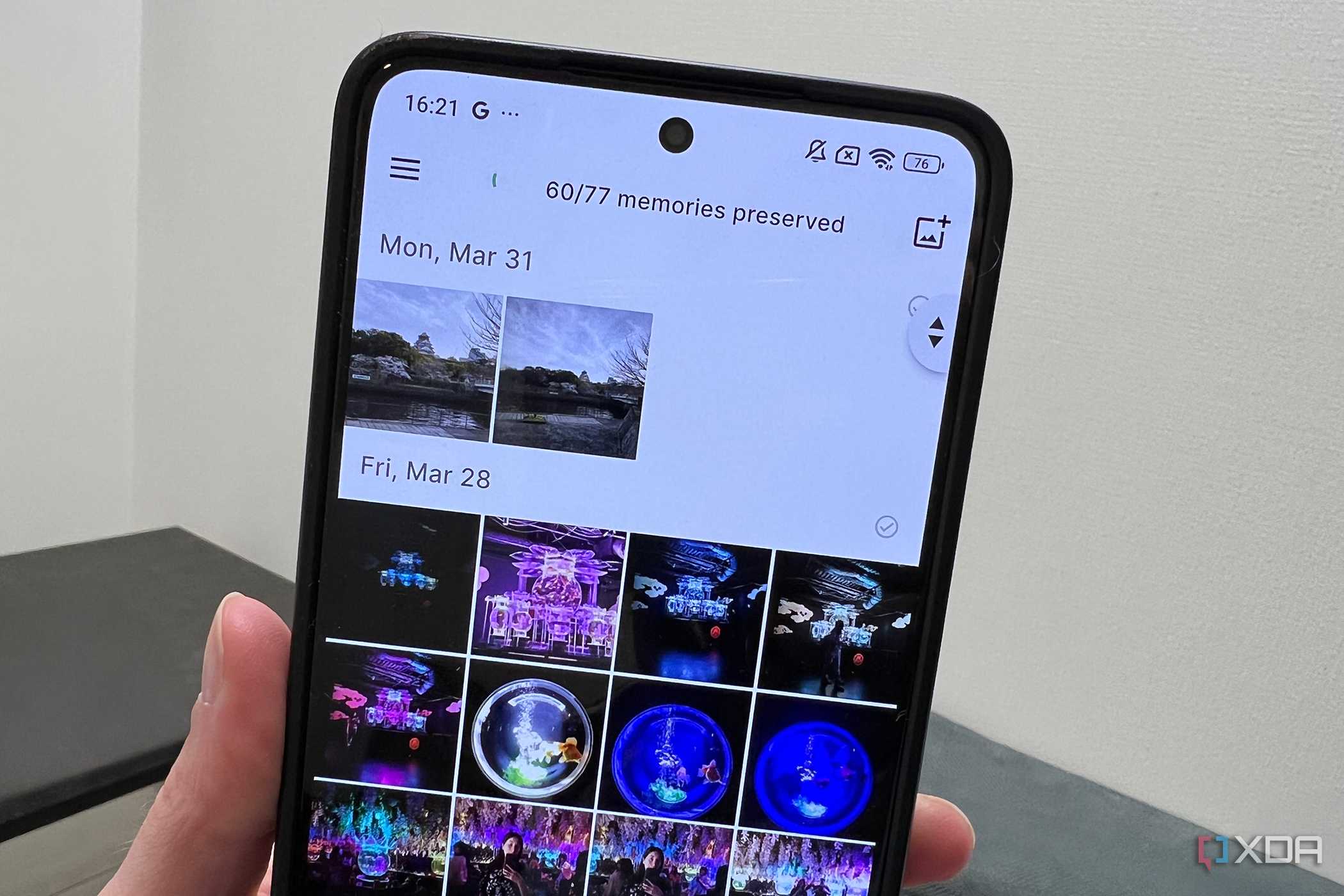 Ente Photos album on mobile in hand