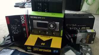 stack of pc parts ready to build