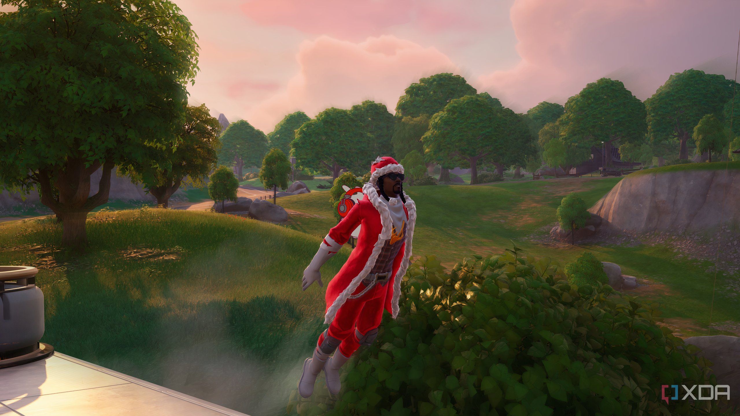 An image from the game Fortnite, showing rapper Snoop Dogg leaping off a train.