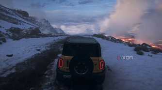 The opening of Forza Horizon 5, showing a yellow Ford Bronco driving down an icy mountain.