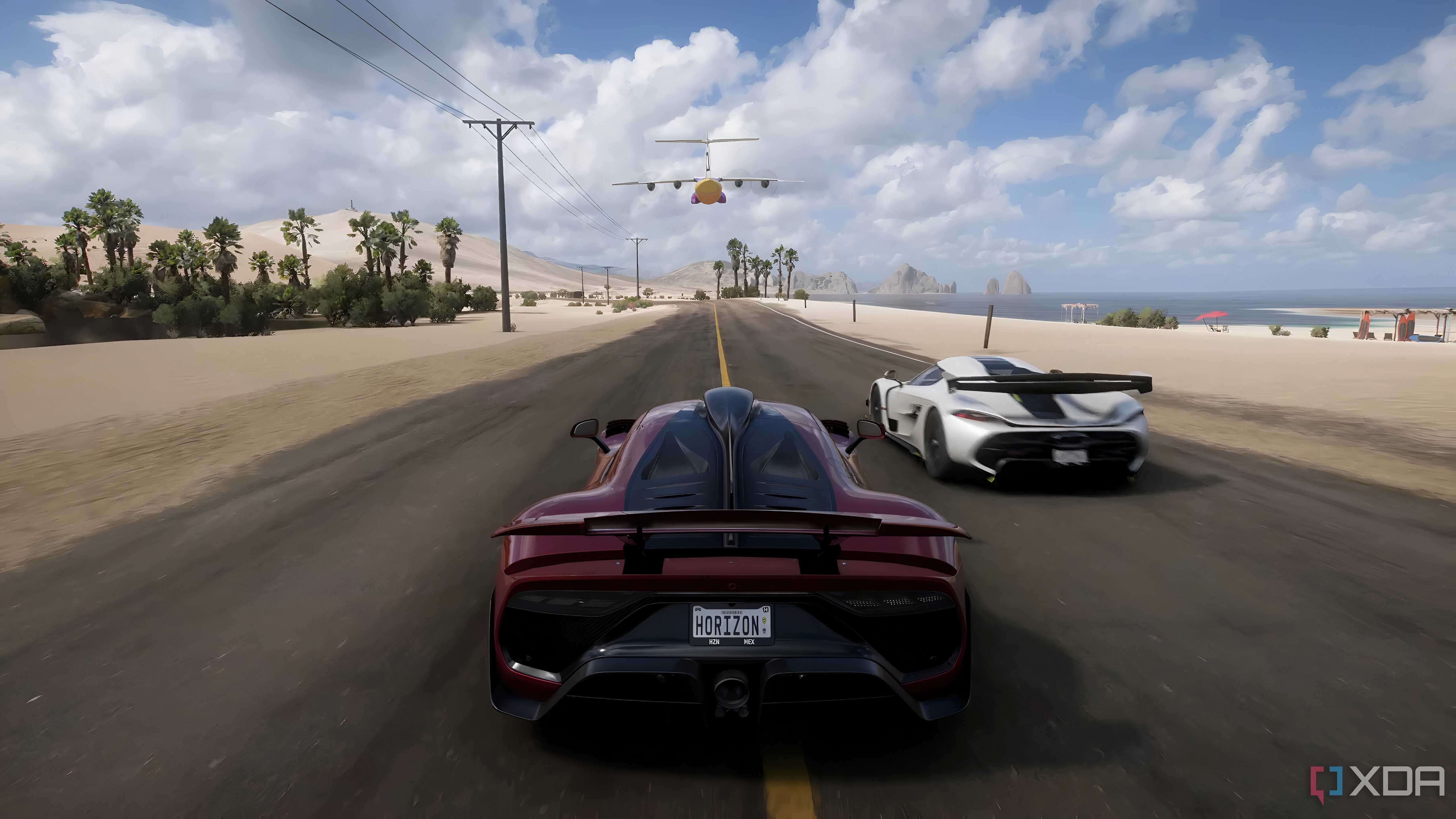 The opening of Forza Horizon 5, showing a red Mercedes AMG-ONE racing along a beach.