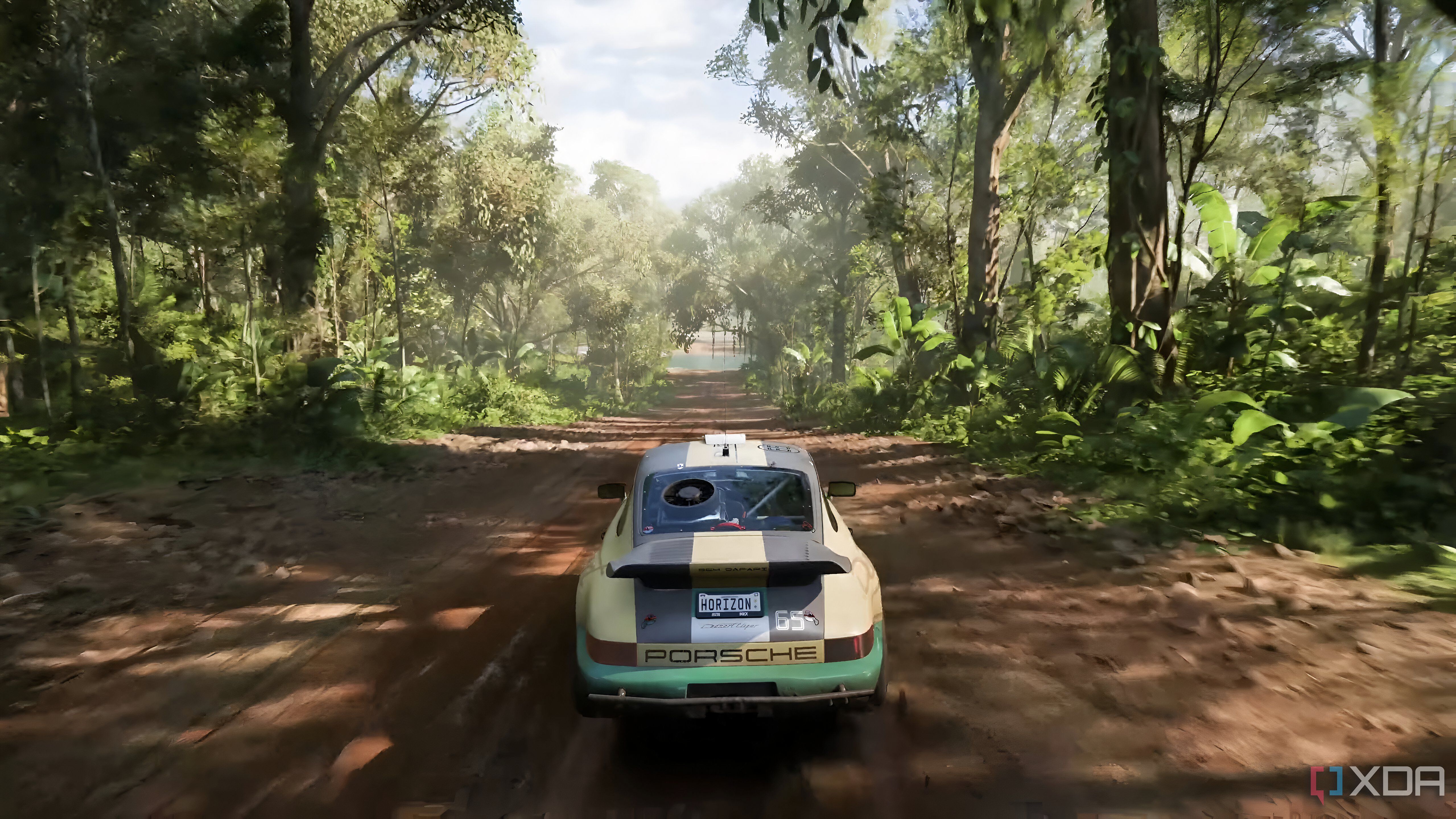 The opening of Forza Horizon 5, showing a Porsche Desert Flyer speeding through a forest trail.