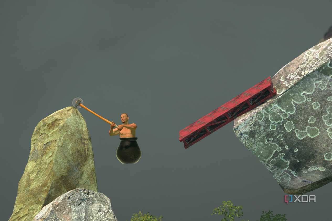 An image from the game Getting Over It with Bennett Foddy, showing the player hanging on to a rock.