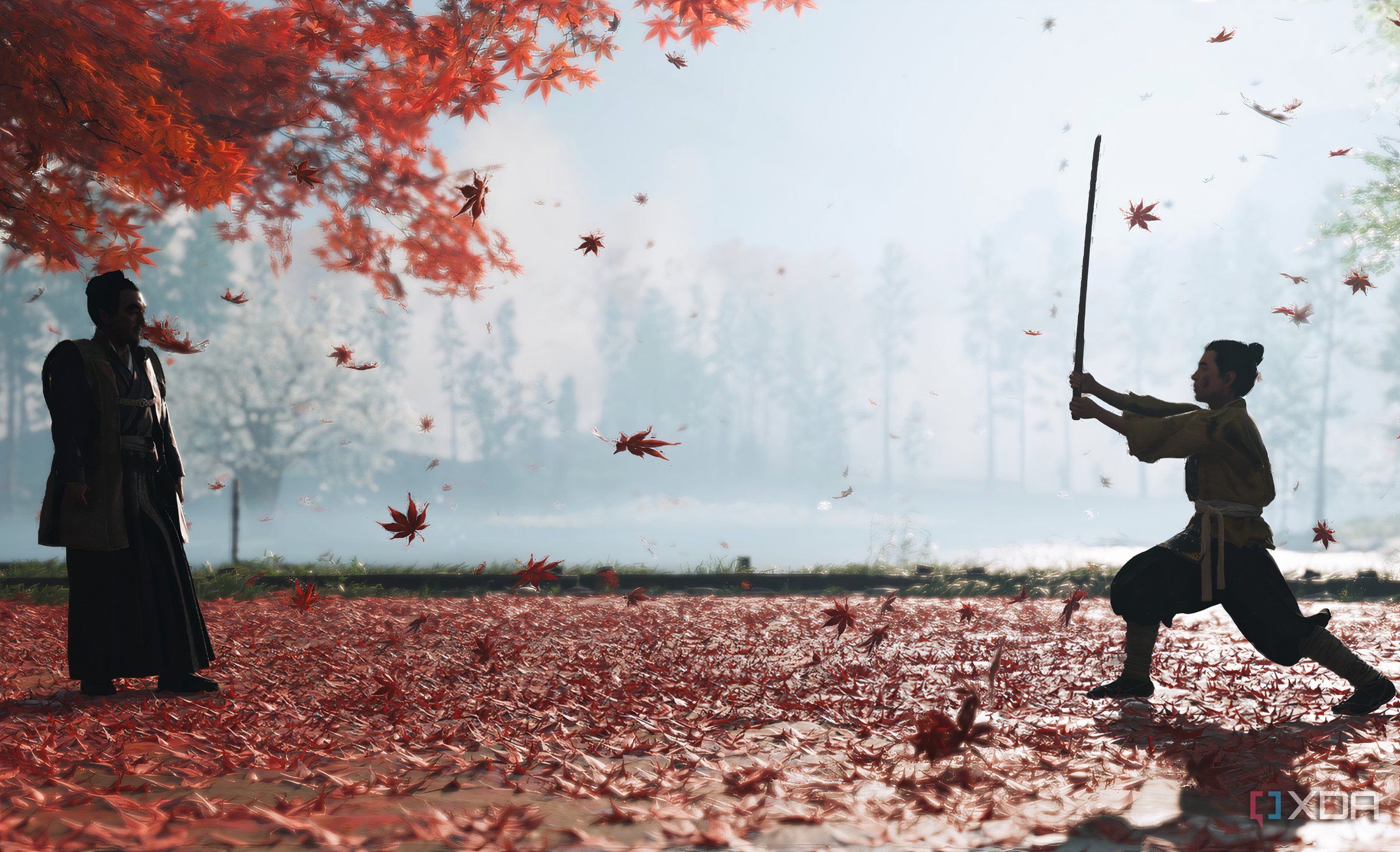 A screenshot from Ghost of Tsushima, showing a young Jin Sakai being trained by his uncle in a field of fallen red leaves.