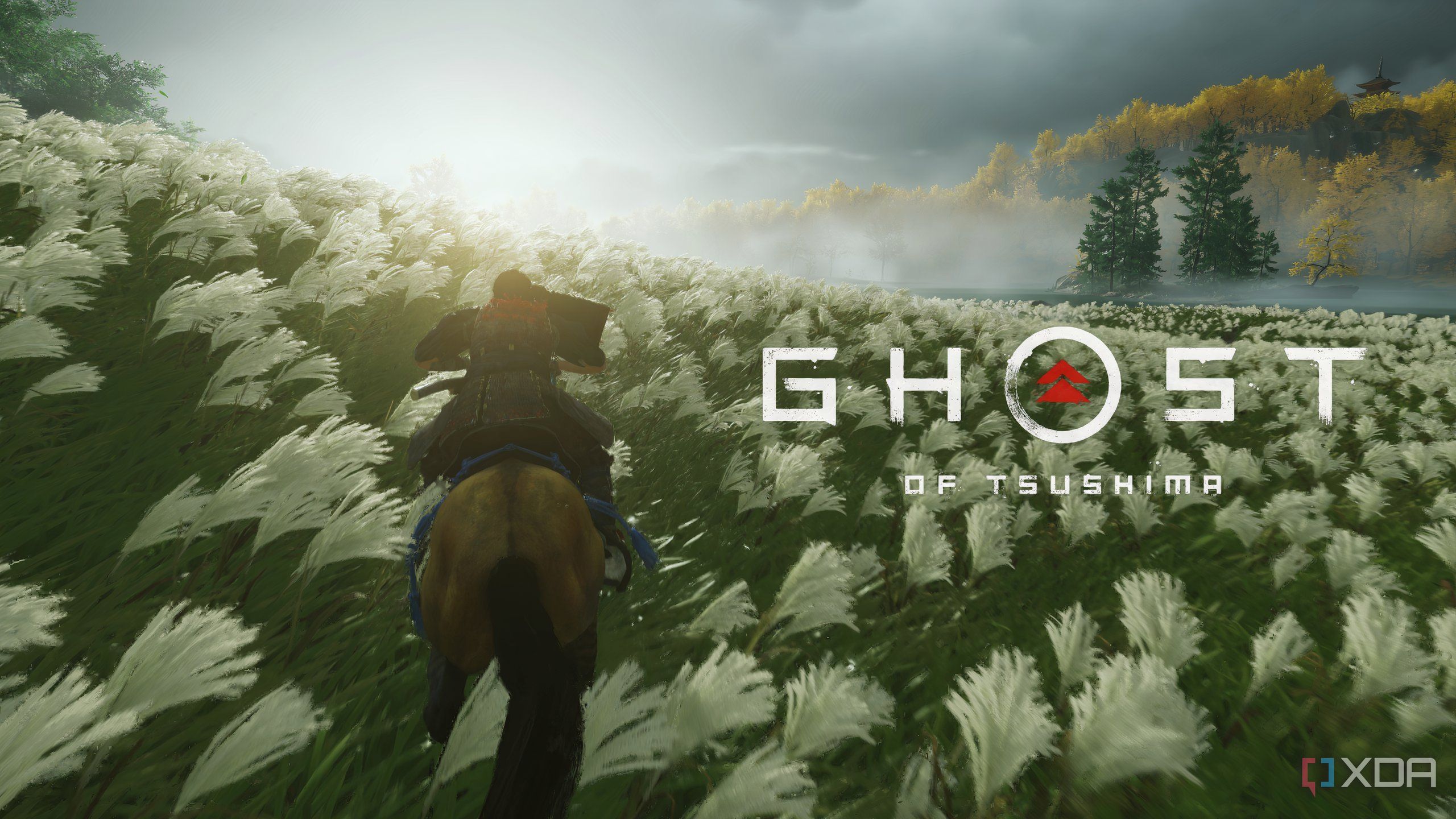 A screenshot from Ghost of Tsushima, showing the game's title card as Jin Sakai rides on horseback through a field of white lilies.