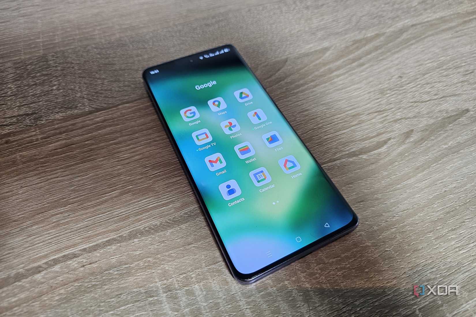 a smartphone showing google apps in a folder
