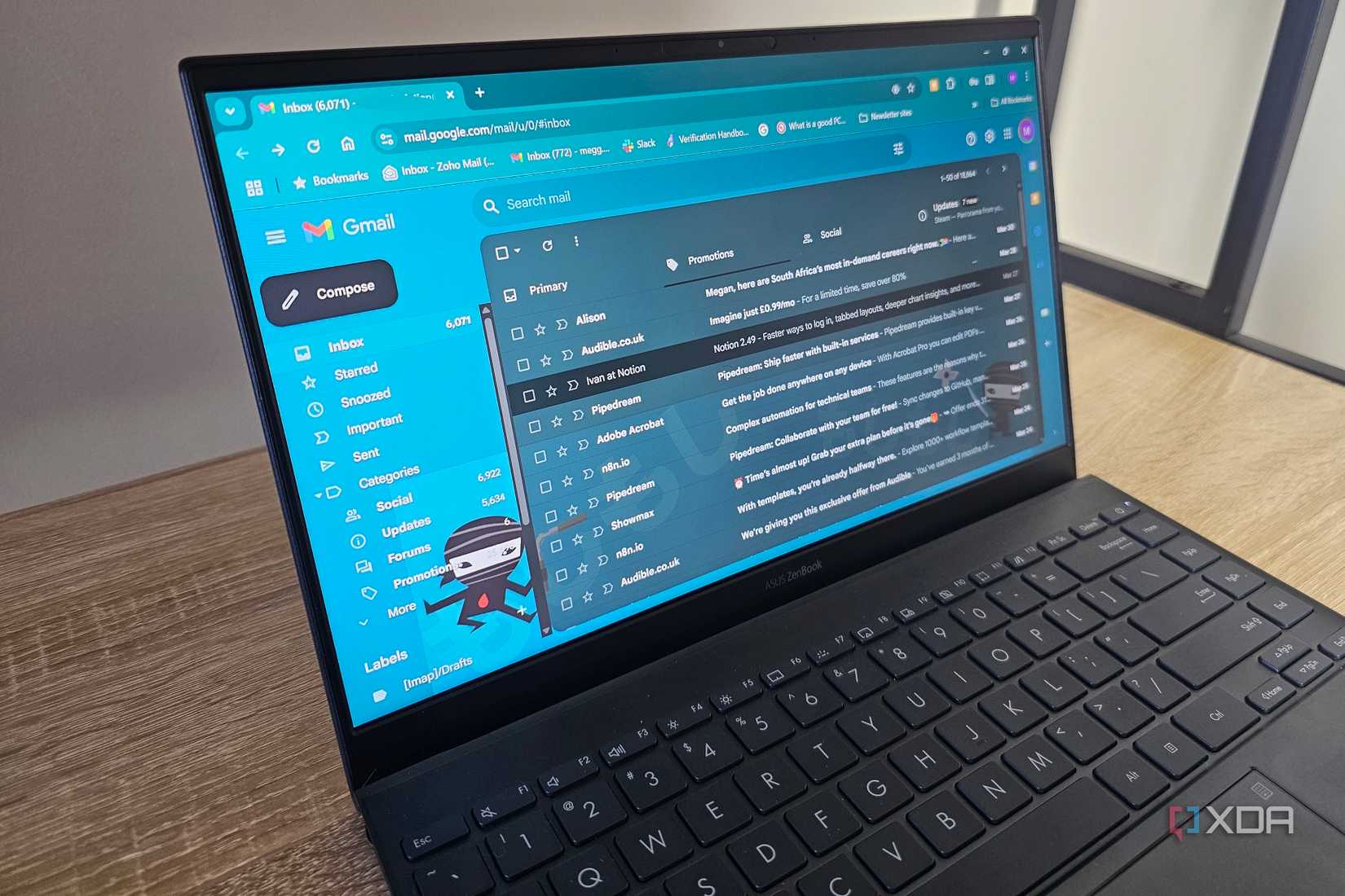 a laptop screen showing a gmail inbox