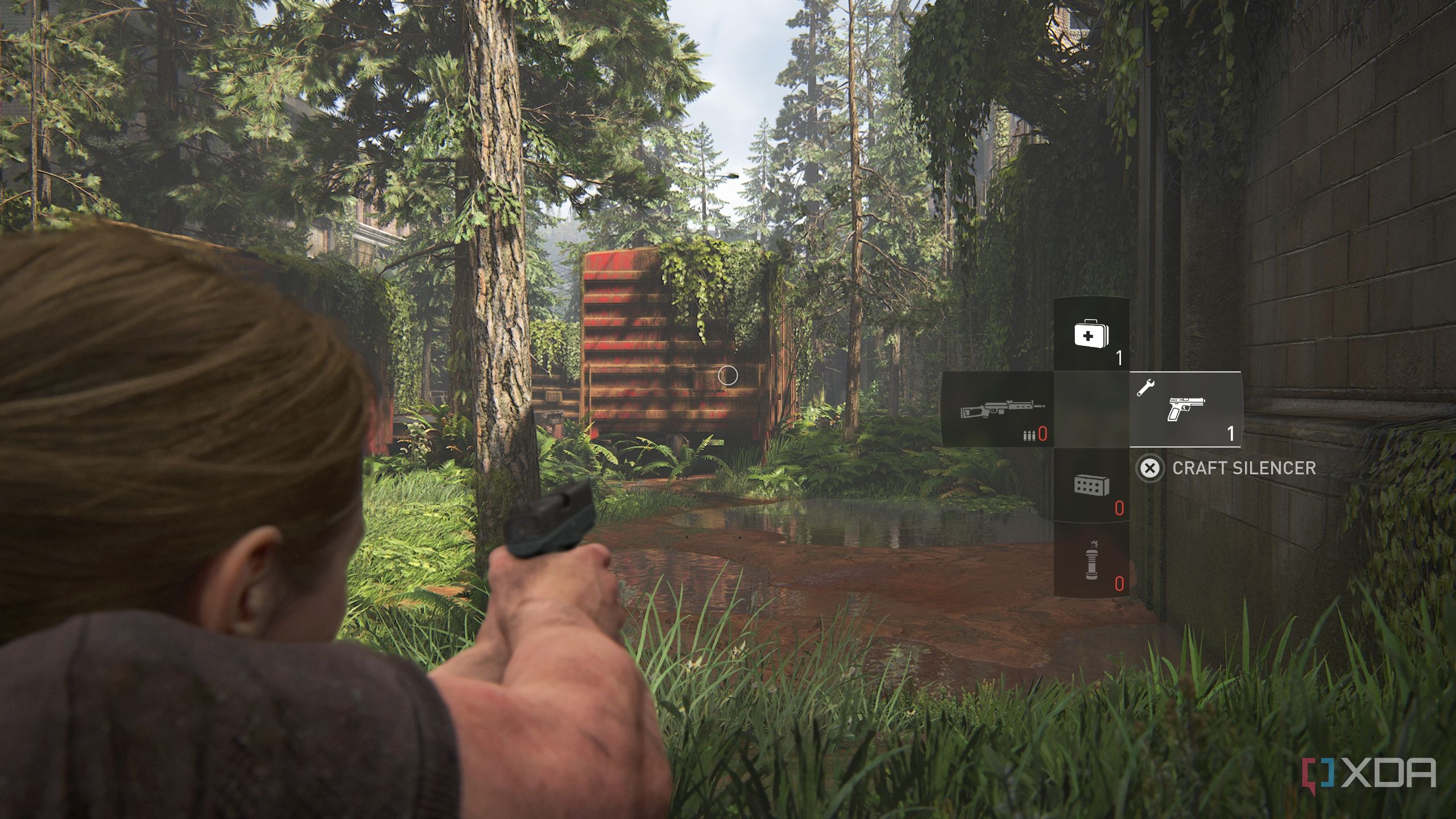 A screenshot from the game The Last of Us Part II, showing Abby prone on the ground with her inventory running low.