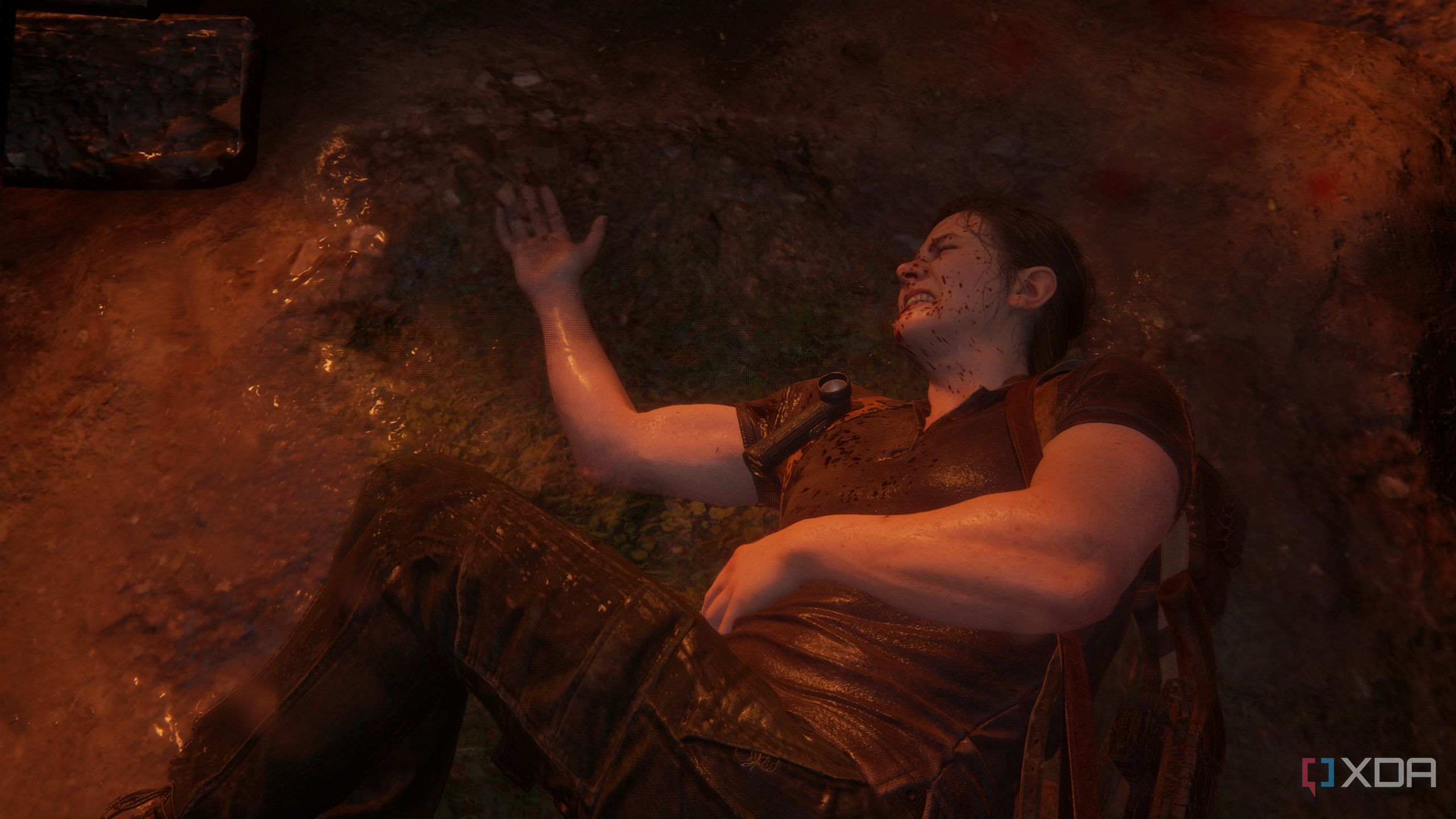 A screenshot from the game The Last of Us Part II, showing Abby dead.