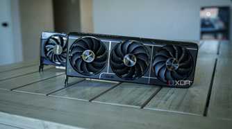 Two Nvidia RTX 5060 Ti GPUs sitting on a table.