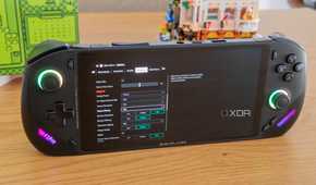 Angled front view of the OneXFly F1 Pro showing graphics settings for Control
