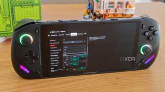 Angled front view of the OneXFly F1 Pro showing graphics settings for Control