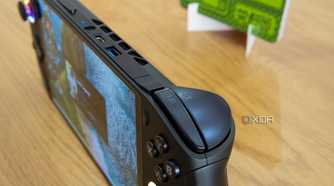 Angled close-up view of the top of the OneXFly F1 Pro, focusing on the right shoulder buttons