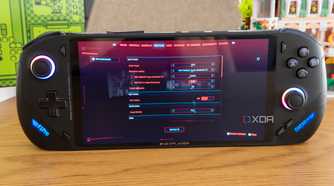 Angled front view of the OneXFly F1 Pro showing graphics settings for Cyberpunk 2077