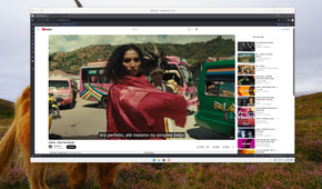 Screenshot of Windows 11 connected to a Proxmox VM running Windows 11 with a Vivaldi window playing a YouTube video