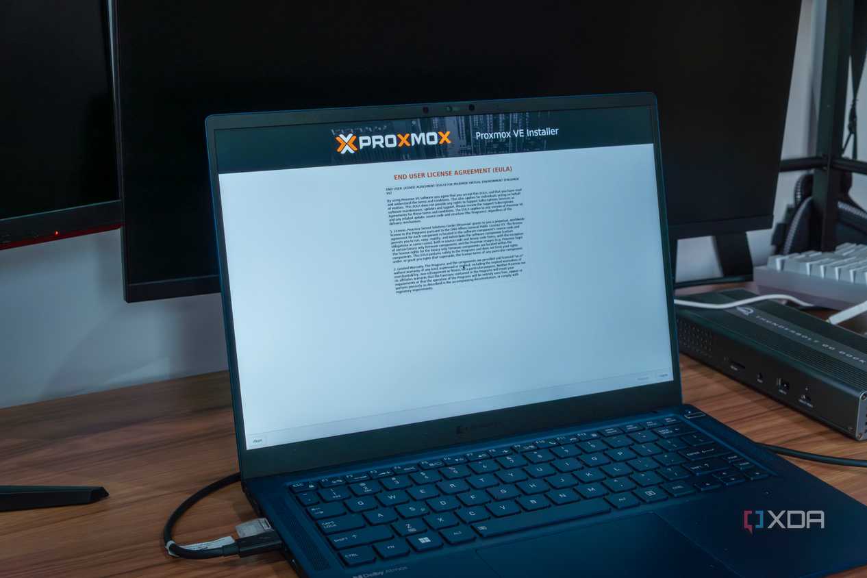 A laptop running the Proxmox setup process