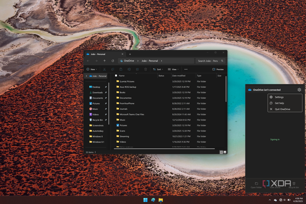 Screenshot of a Windows 11 desktop with a OneDrive flyout showing the option to quit the app