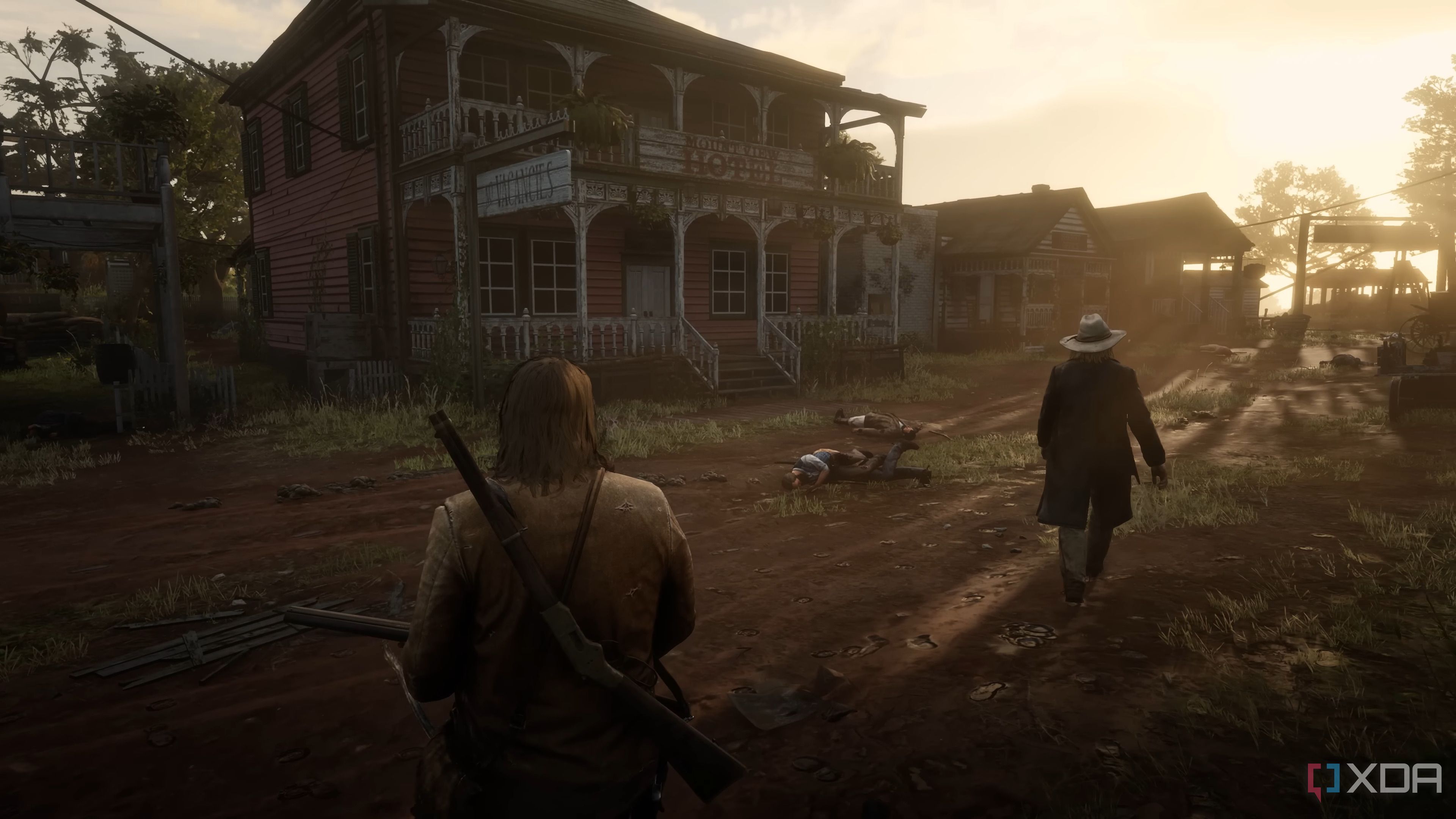 An image from the game Red Dead Redemption 2, showing two men at dusk.