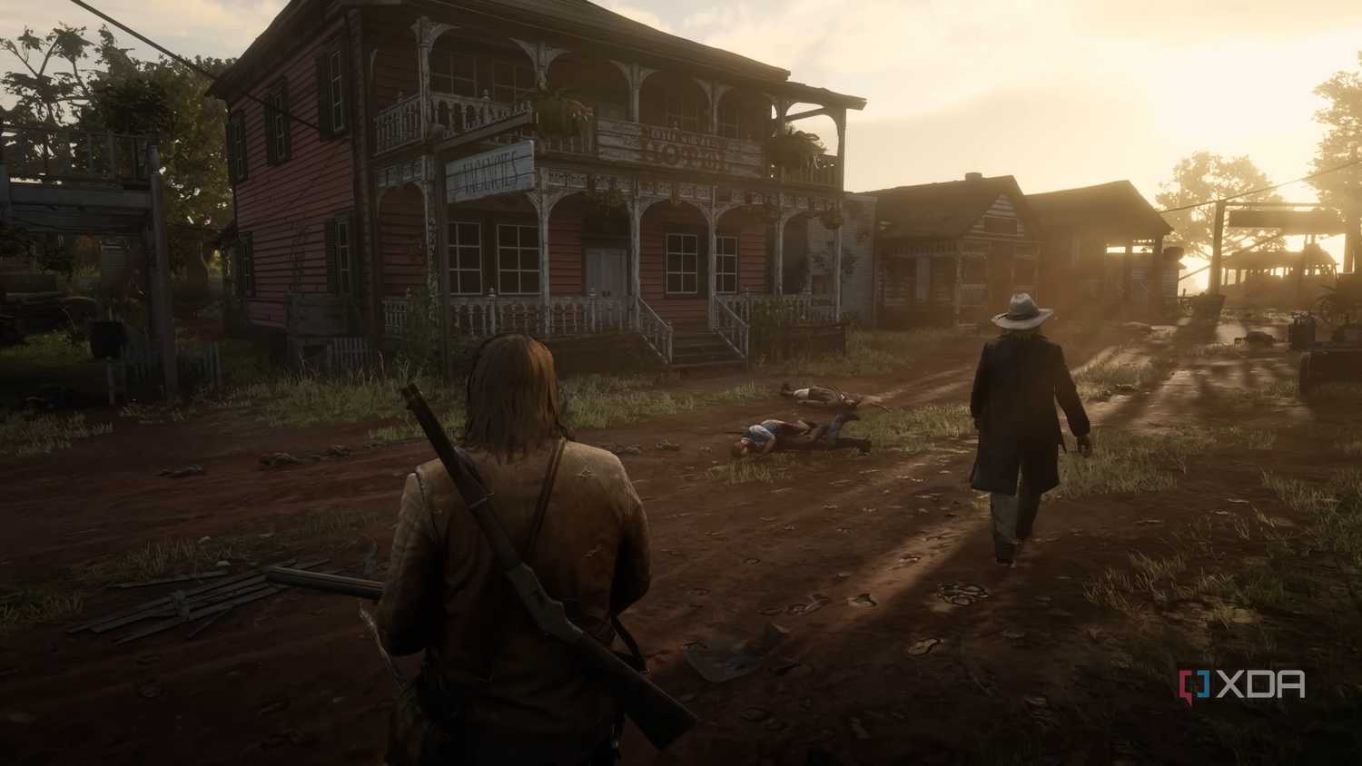 An image from the game Red Dead Redemption 2, showing two men at dusk.
