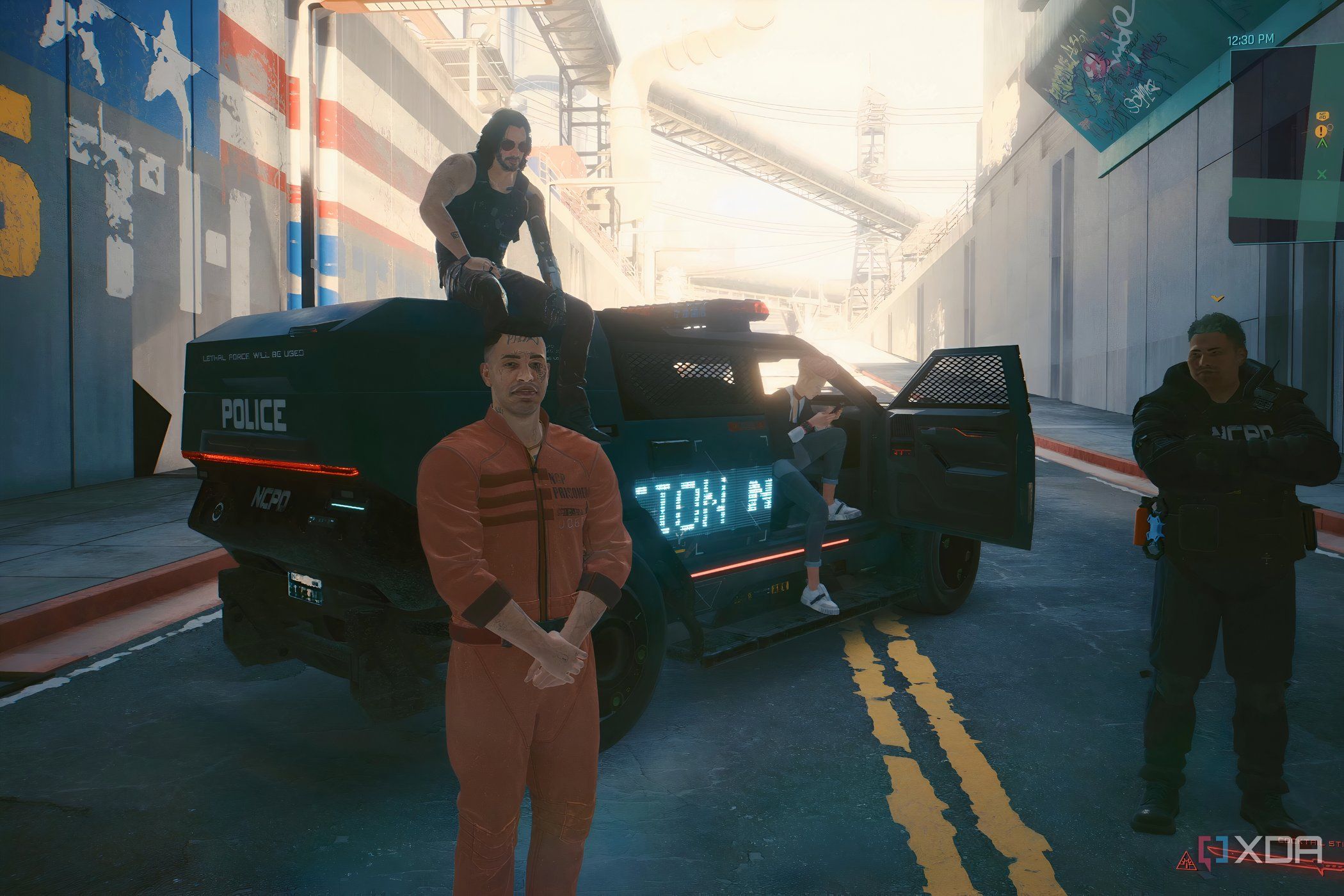 A screenshot from Cyberpunk 2077, showing a man in an orange jumpsuit, and another man sitting atop a police vehicle.