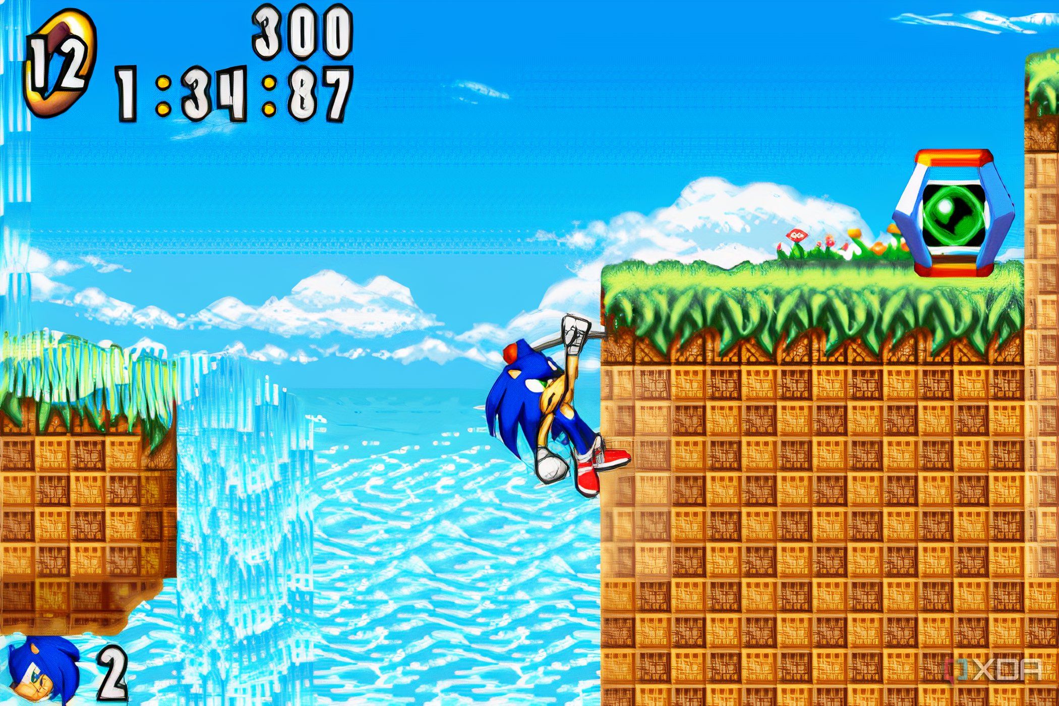 A screenshot from the game "Sonic Advance", showing Sonic grabbing onto a pole jutting out of a cliff wall.