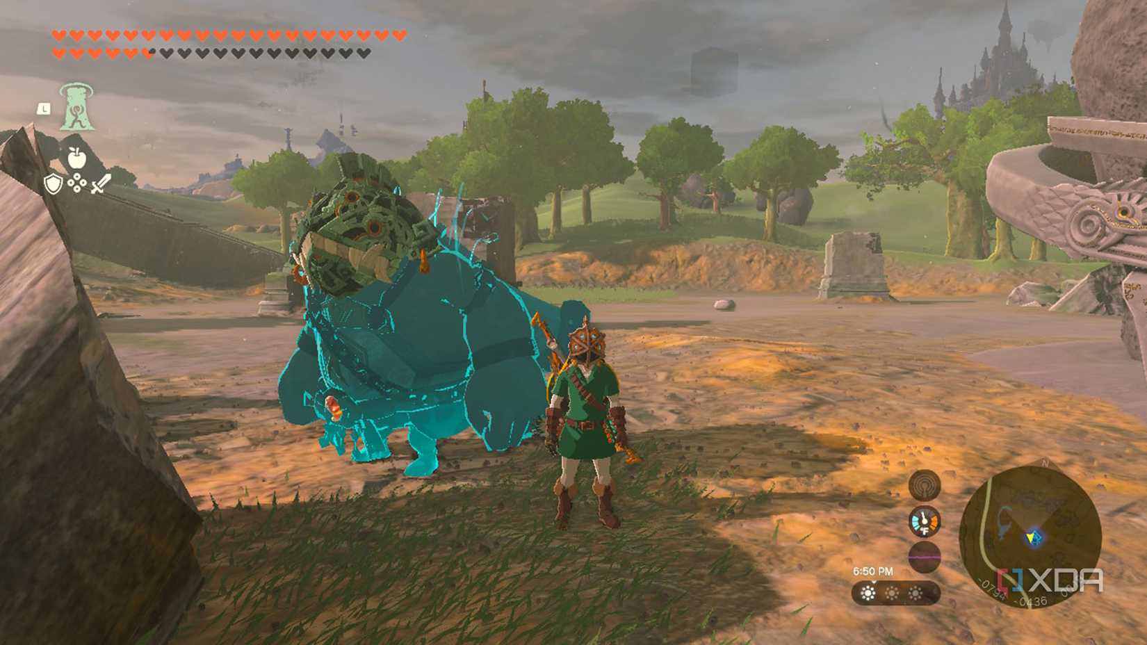 Link and the spirit Yunobo wearing a divine beast mask.