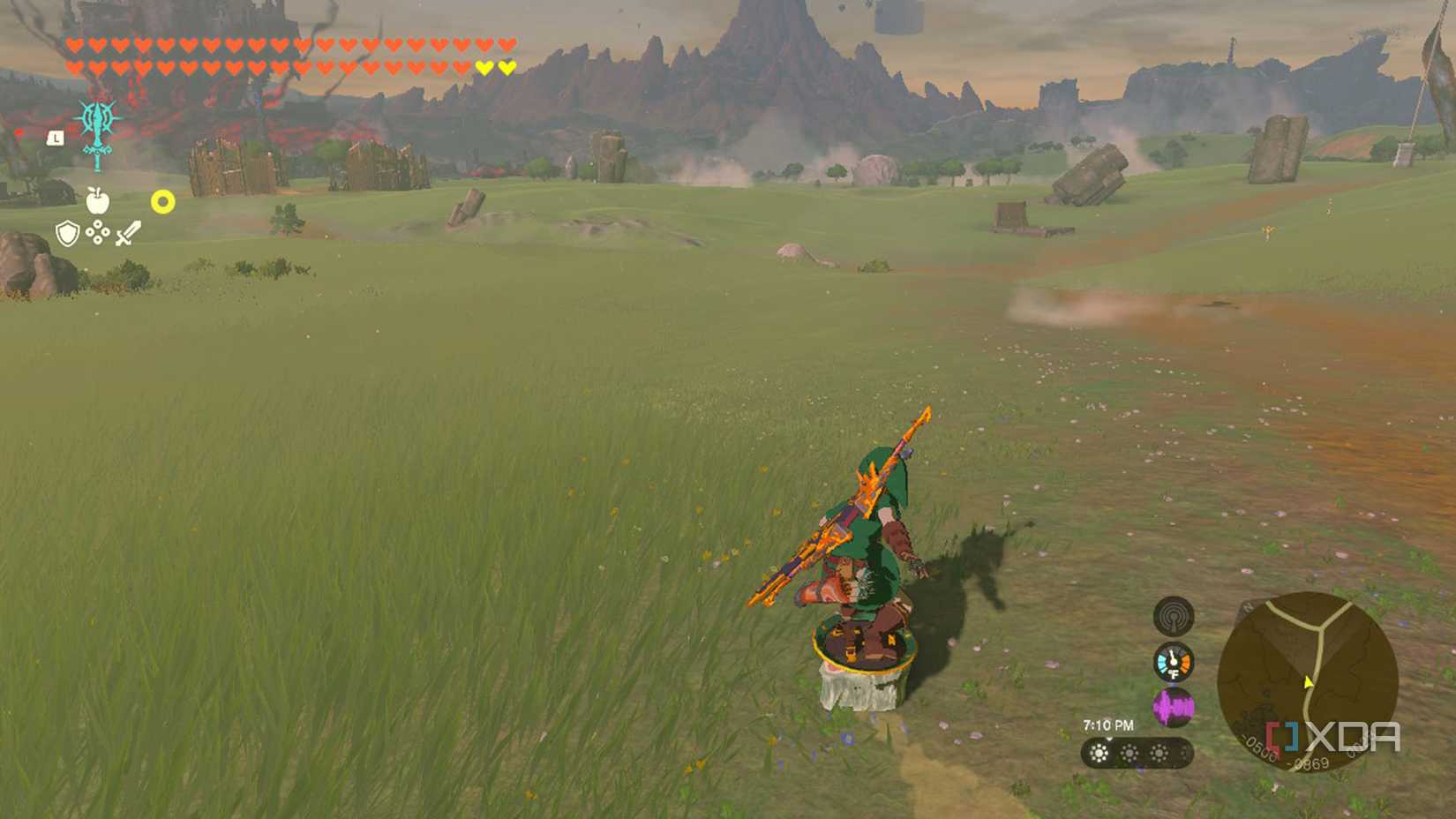 Link shield surfing through a field on frozen meat.