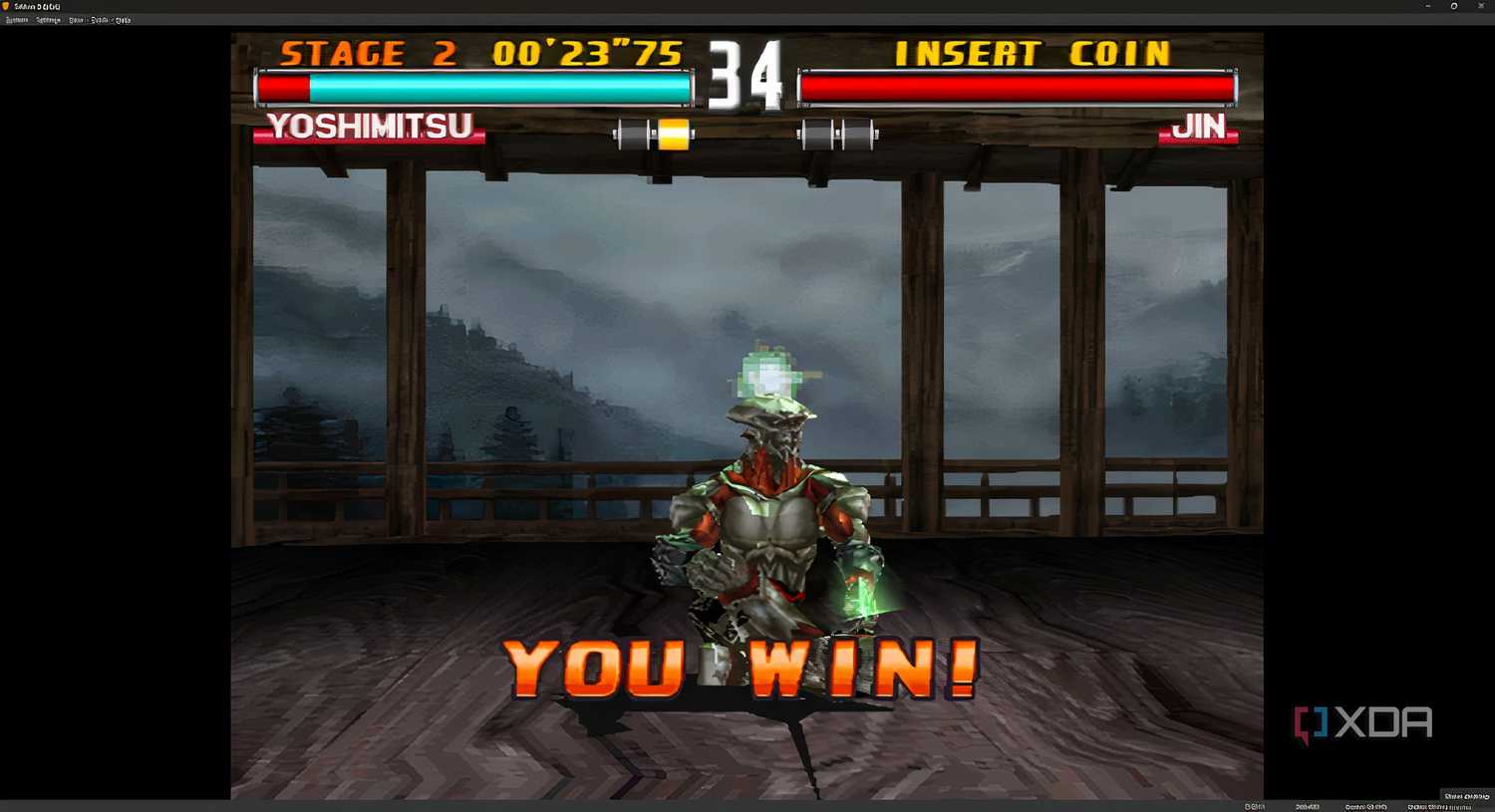 A screenshot from the game "Tekken 3", showing Yoshimitsu sitting cross-legged after a victory.